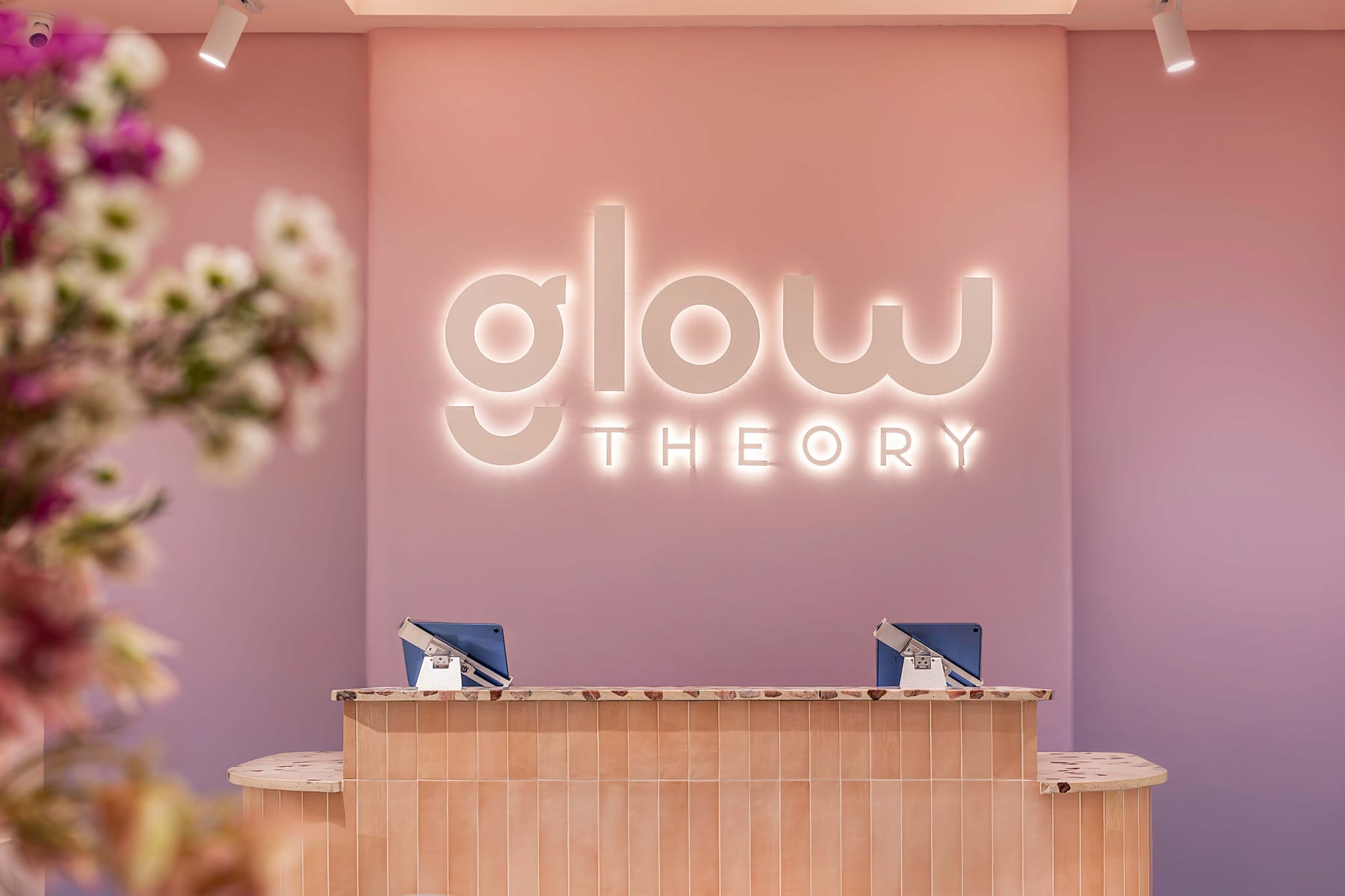 Glow Theory — the store interior, glow sign over the counter